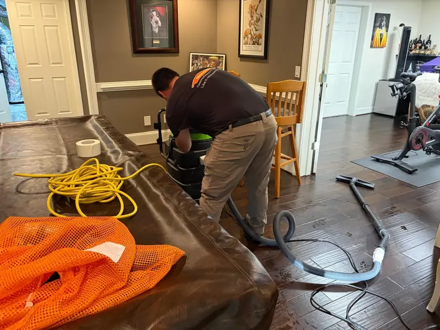 Standing water extracted from a hardwood floor