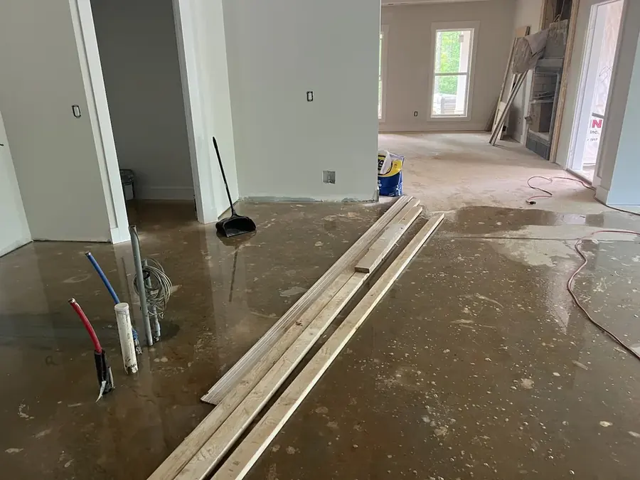 Burst pipe water damage being dried in a High Point, NC home